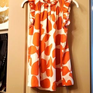 High neck top with ruffle detail on neck and sleev